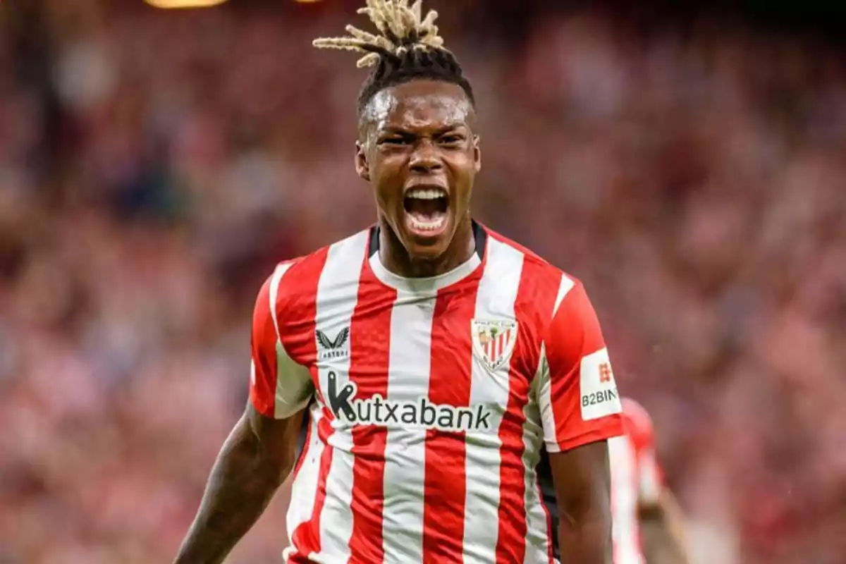 Soccer player in red and white uniform celebrating on the field. Soccer player in red and white uniform celebrating on the field.