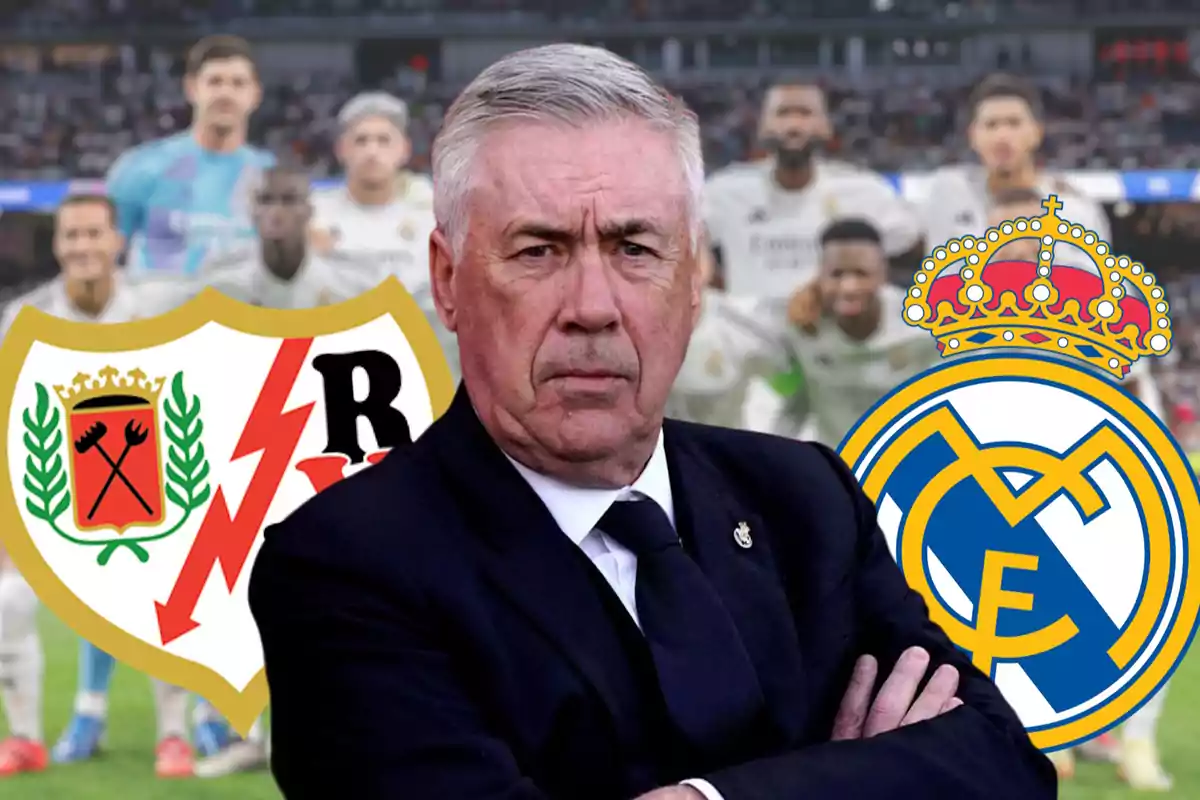 Un hombre de traje con expresión seria está frente a los escudos del Rayo Vallecano y el Real Madrid, con jugadores de fondo.