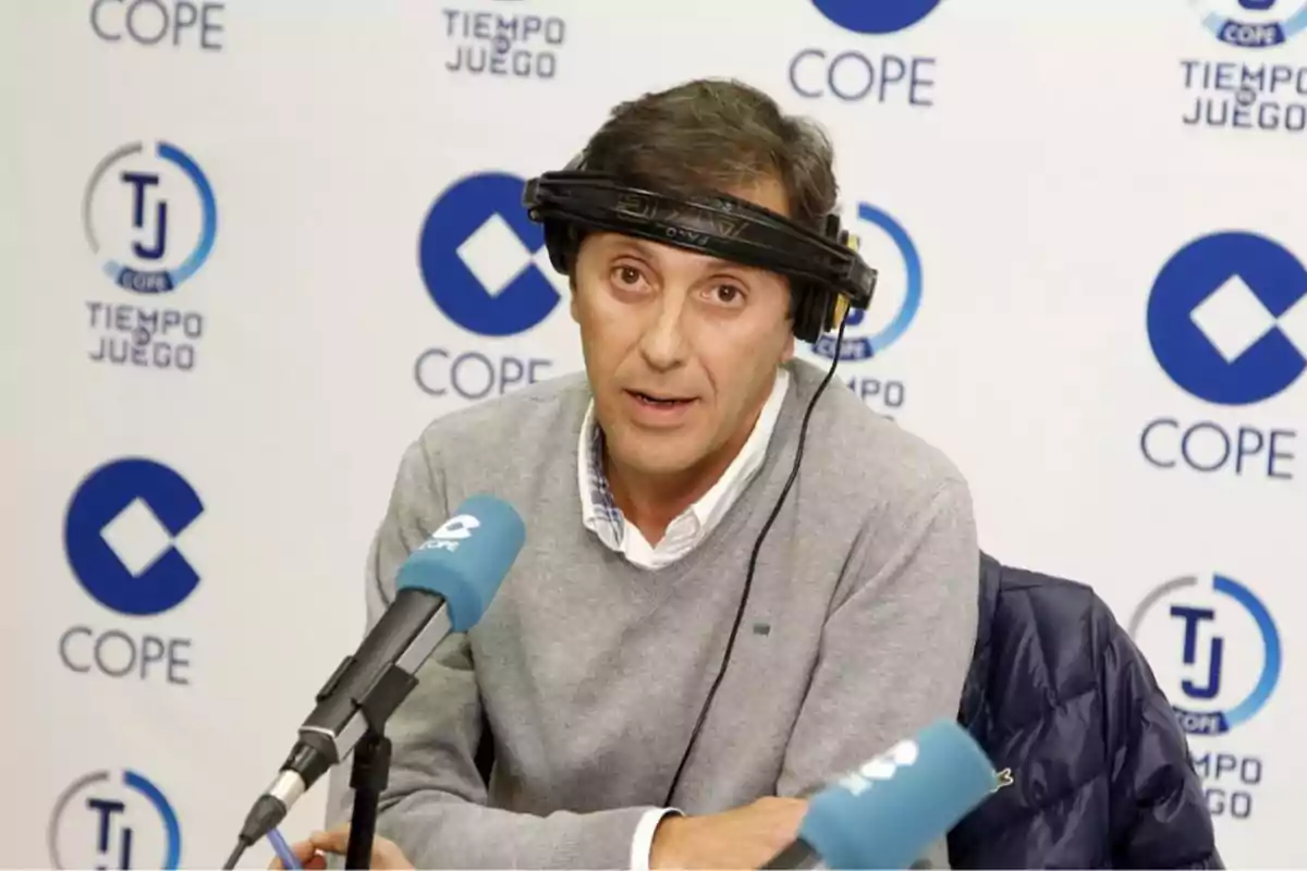 Man with headphones and microphone in a COPE radio studio. Man with headphones and microphone in a COPE radio studio.