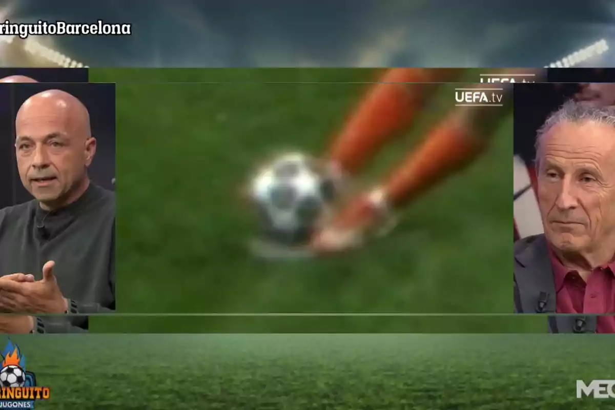 Two men on a sports show argue while a blurry image of a soccer ball on the grass appears in the center of the screen.