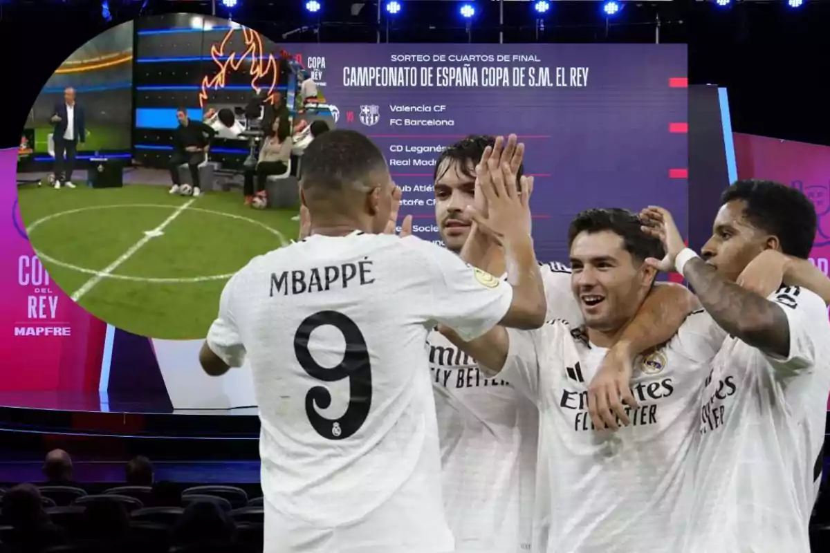 Soccer players celebrate in front of a screen showing the Copa del Rey draw.