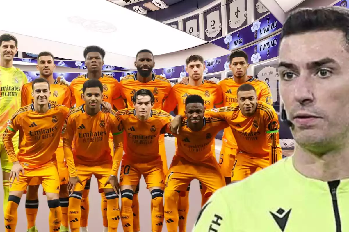 A group of players in orange uniforms posing in a locker room, with a referee in the foreground.