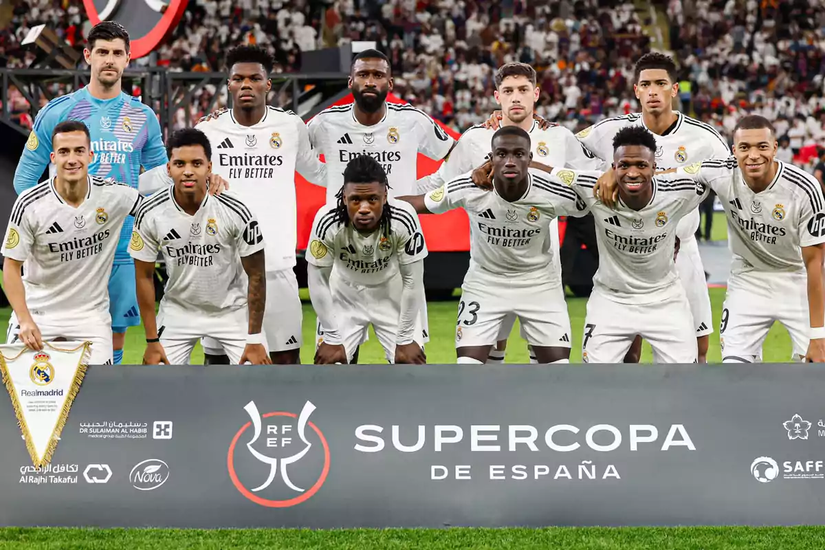 Real Madrid players posing on the field before a Spanish Super Cup match. Real Madrid players posing on the field before a Spanish Super Cup match.