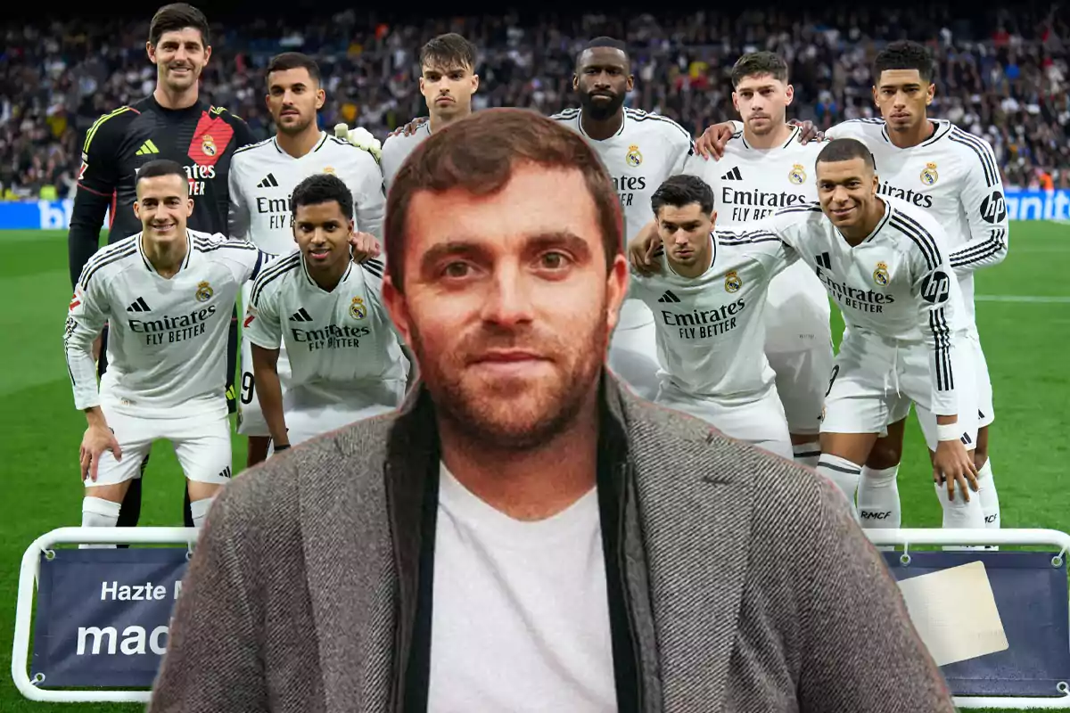 A man in the foreground with a group of Real Madrid players posing on the soccer field in the background