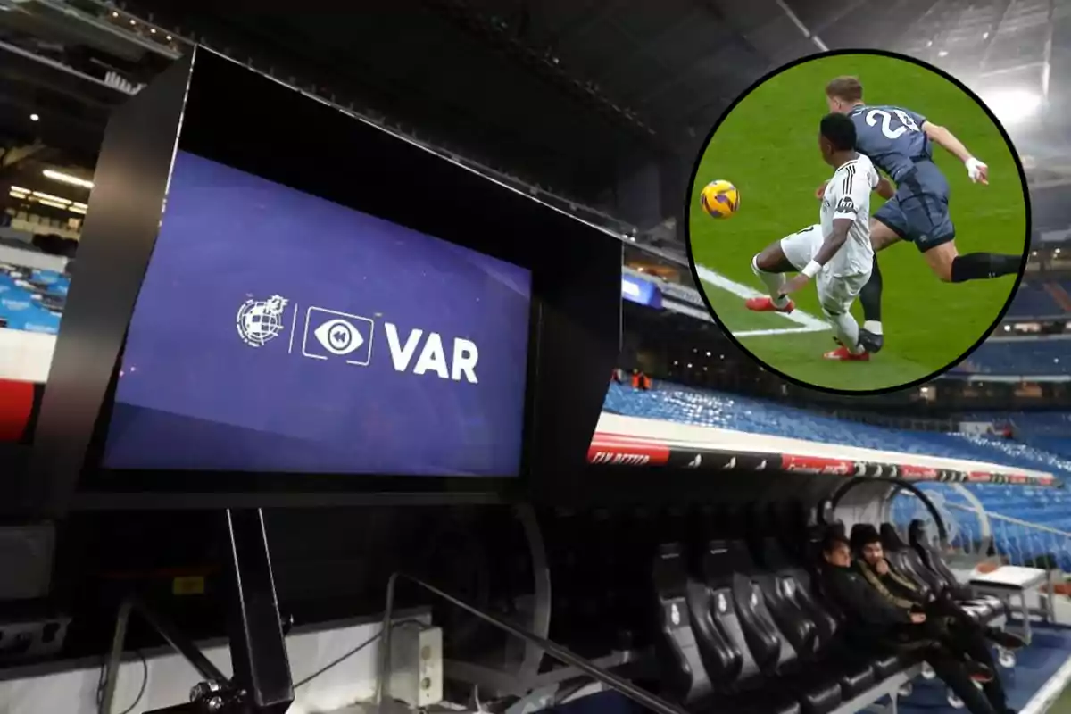 VAR screen in a soccer stadium with a box showing a play under review.