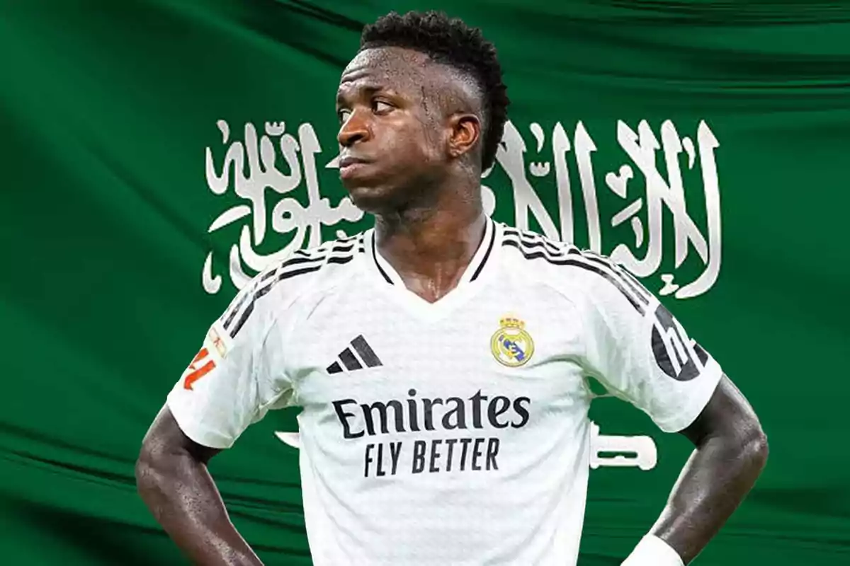 Football player in white jersey in front of a green flag with Arabic writing.