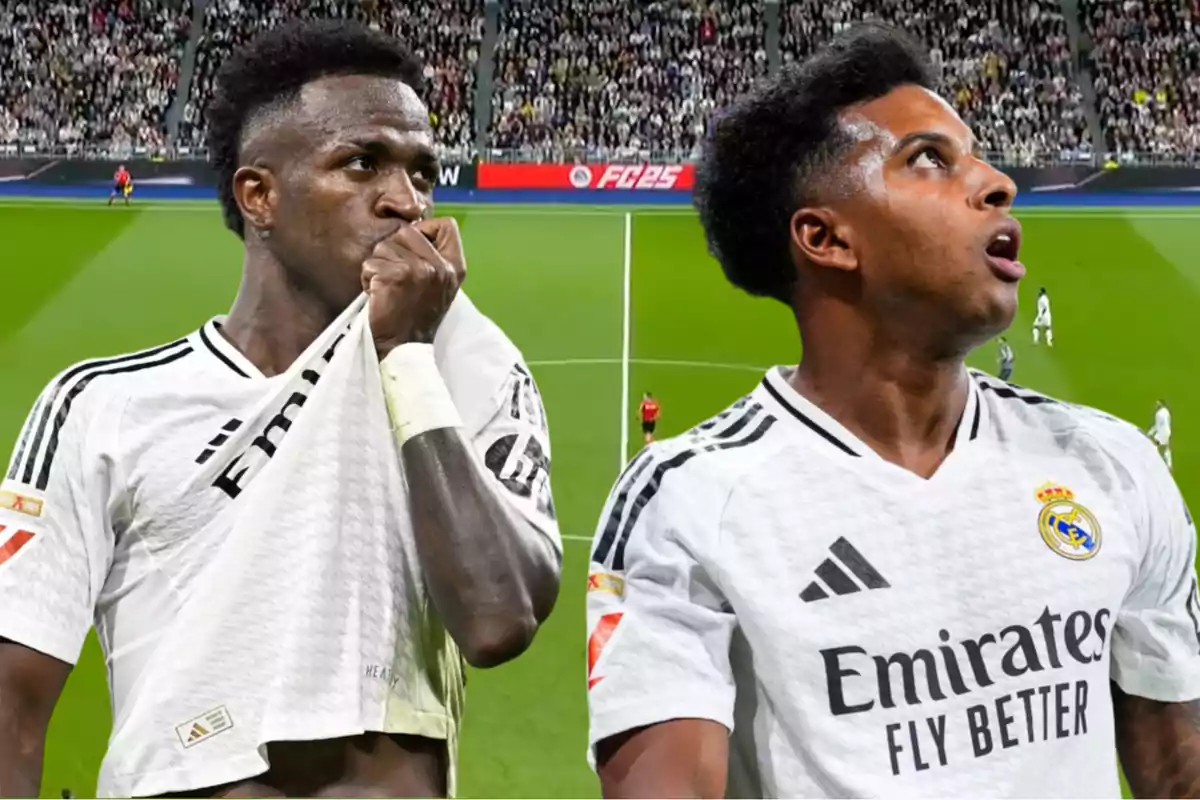 Dos jugadores de fútbol con camisetas blancas del Real Madrid en un estadio lleno de espectadores.