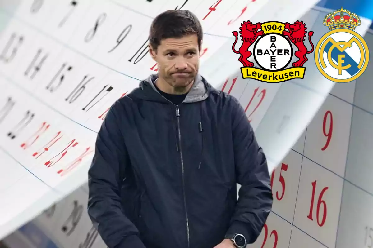 Un hombre con chaqueta oscura está frente a un fondo de calendario con los logotipos de Bayer Leverkusen y Real Madrid.