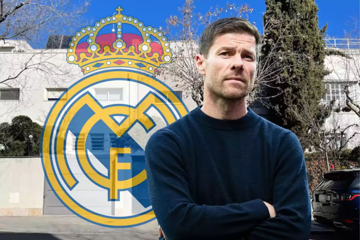 Un hombre de pie con los brazos cruzados frente a un edificio, con el escudo del Real Madrid superpuesto en la imagen.