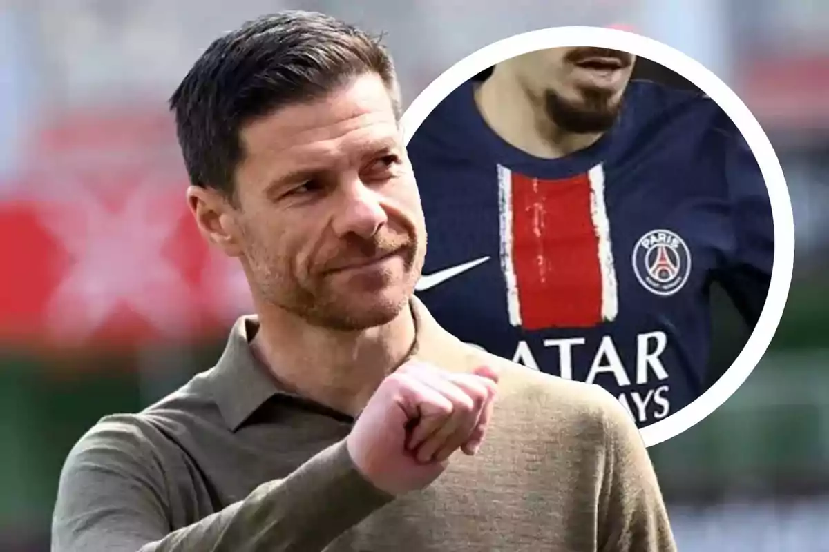 Man in a beige jersey making a hand gesture, with a cutout of a player in a PSG jersey in the background.
