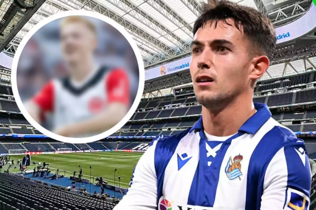 Un jugador de fútbol con la camiseta de la Real Sociedad en un estadio con un logotipo de Real Madrid en el fondo y un círculo borroso con otra figura en el lado izquierdo.